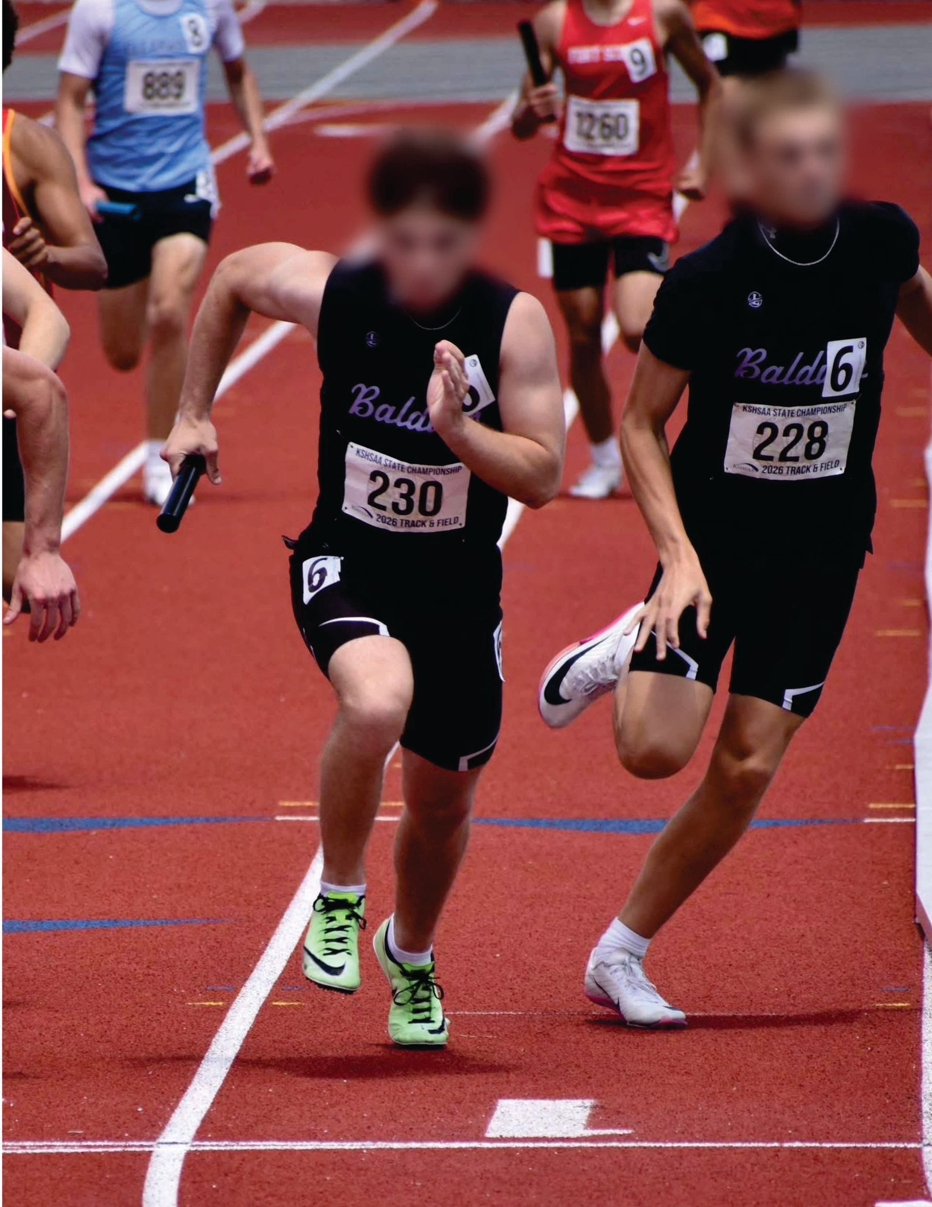 Track runners sprinting on a red track, with two black Liddle's uniformed runners in the foreground