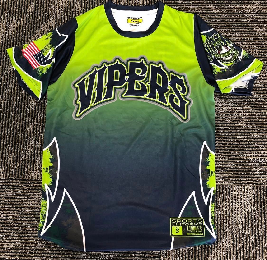Green and navy Vipers baseball jersey with team logo, white accents, and American flag detail.