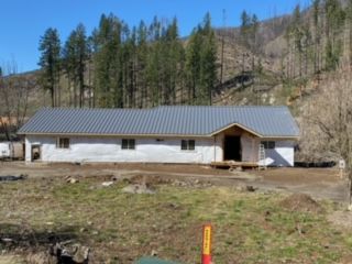 A house adorned with a durable metal roof - Springfield, OR - McKenzie Roofing Inc.