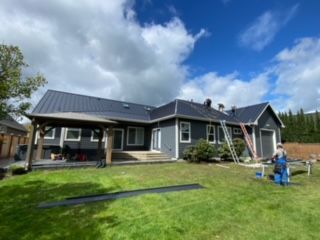 House with metal roof set - Springfield, OR - McKenzie Roofing Inc.