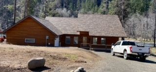 A brown cabin - Springfield, OR - McKenzie Roofing Inc.