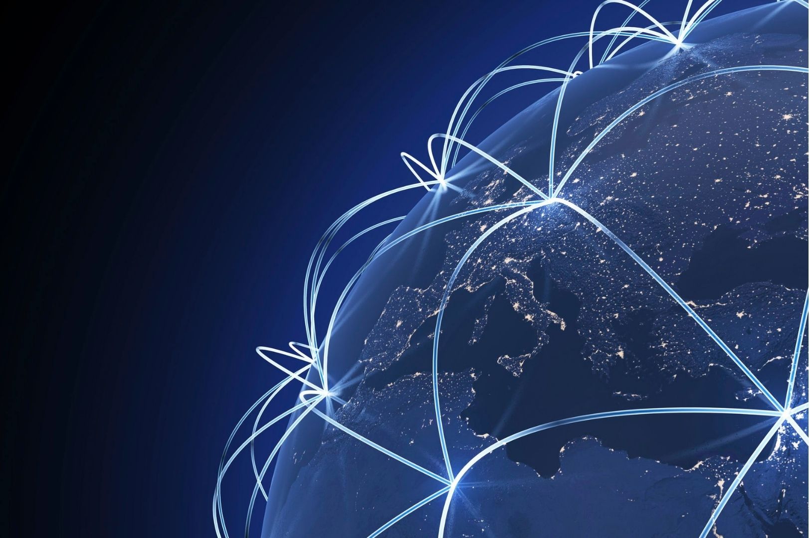 Glowing network lines linking points across a digital Earth on a dark blue background