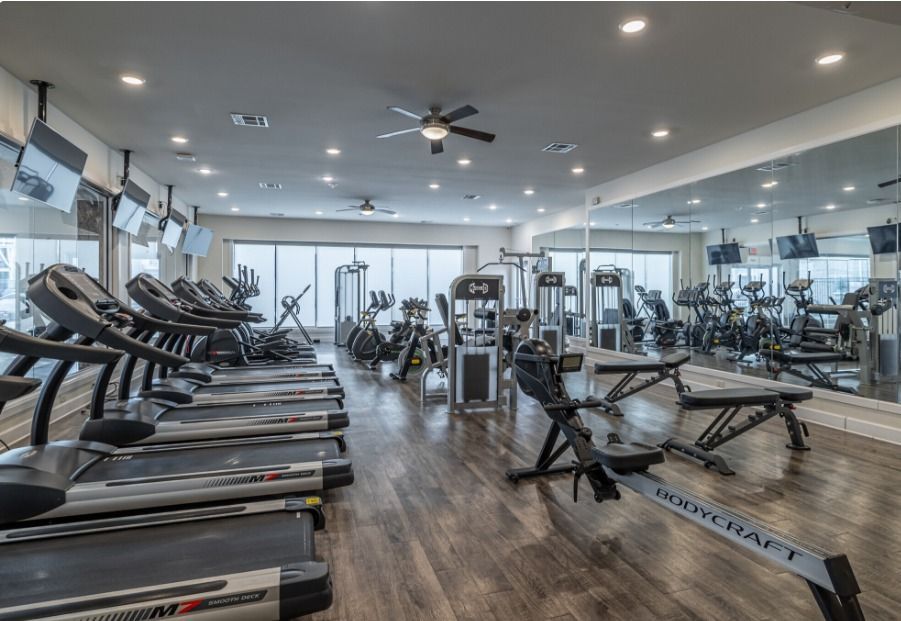 gym at watercolors of centerton apartments