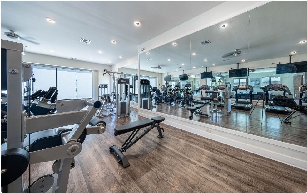 fitness room at watercolors of centerton apartments