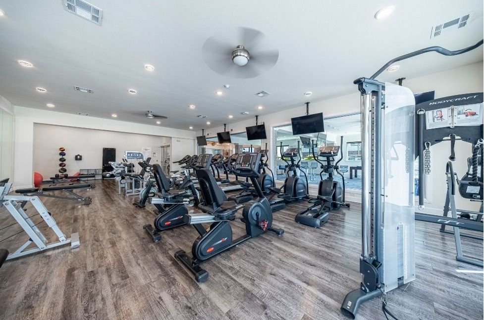 fitness room at watercolors of centerton apartments