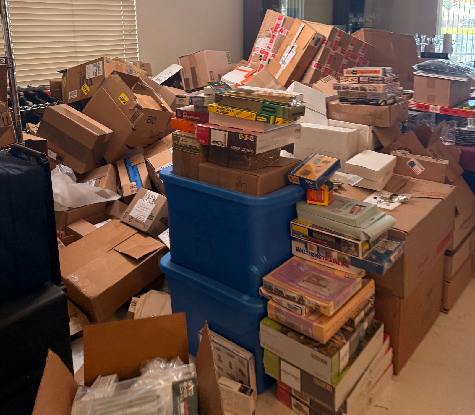 A row of cardboard boxes in a domestic room during a house move — Southwest, FL — ProRemedy SWFL A row of cardboard boxes in a domestic room during a house move — Southwest, FL — ProRemedy SWFL