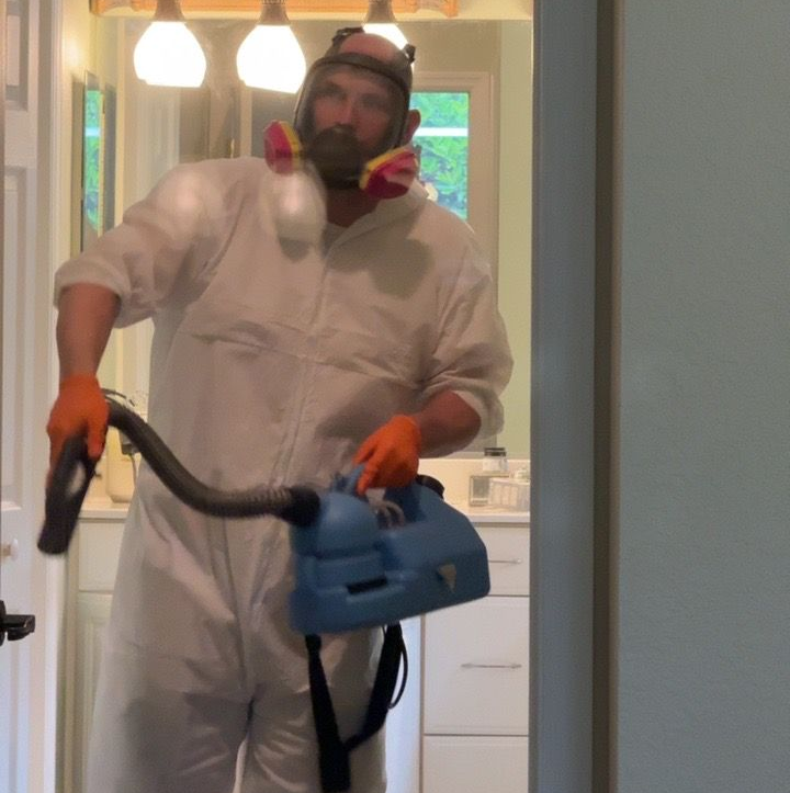 Man With White Suit And Mask — Southwest, FL — ProRemedy SWFL