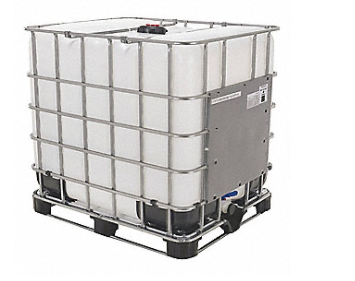 A white plastic IBC tank inside a protective metal cage on a pallet, used for storing or transporting liquids.