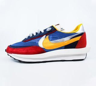 A pair of colorful nike sneakers on a white background.