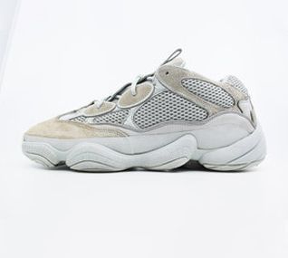 A pair of white sneakers on a white background.