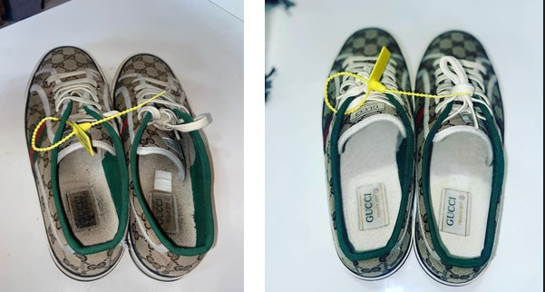 A pair of gucci shoes are sitting on a table