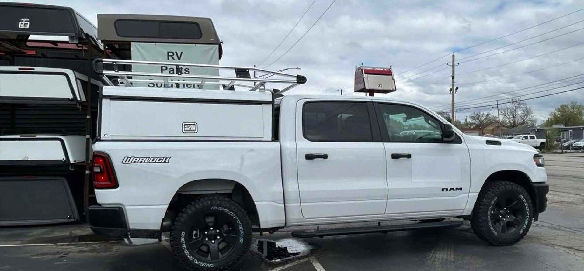 White Ram truck with utility bed rack