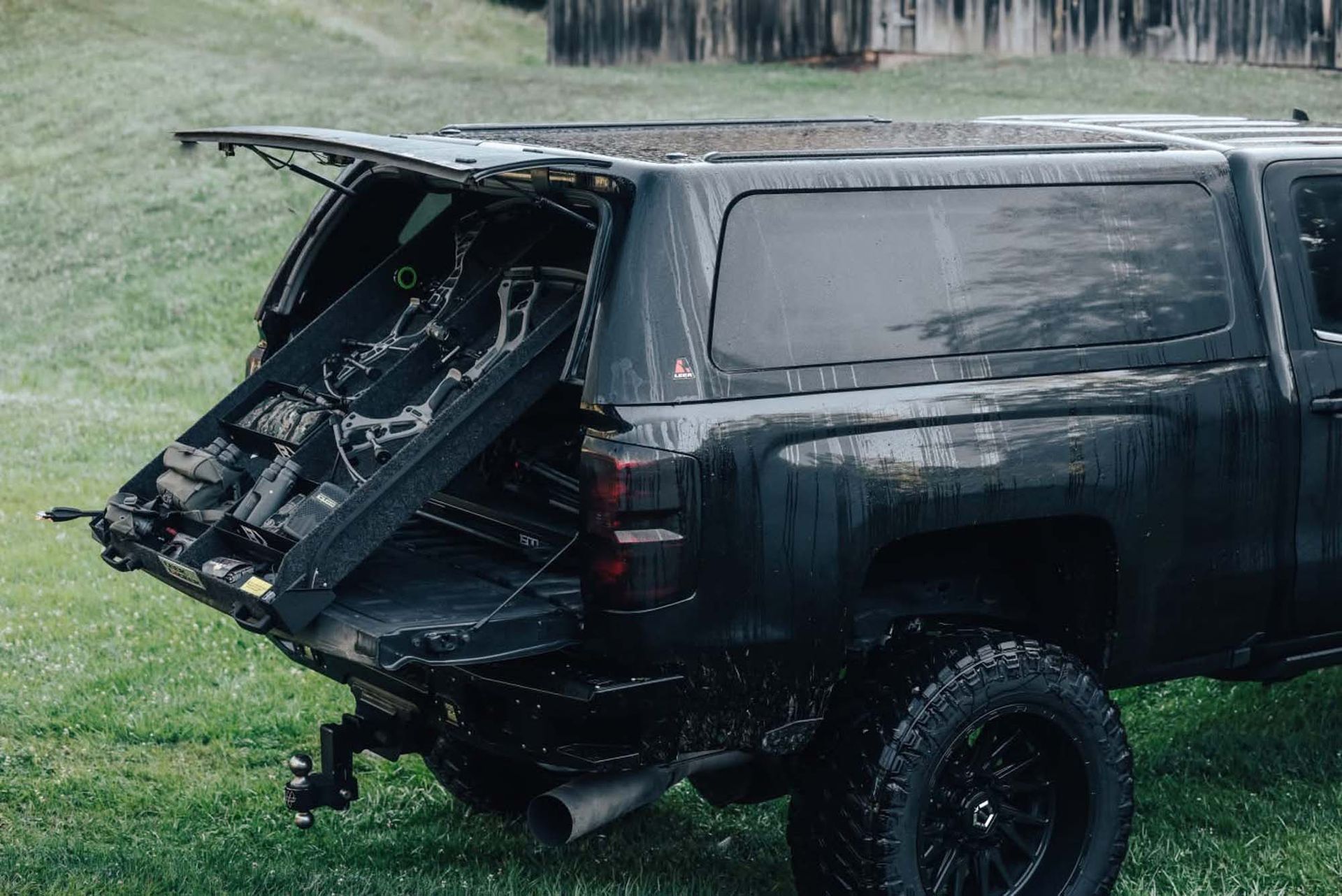 Truck bed with gun safe storage