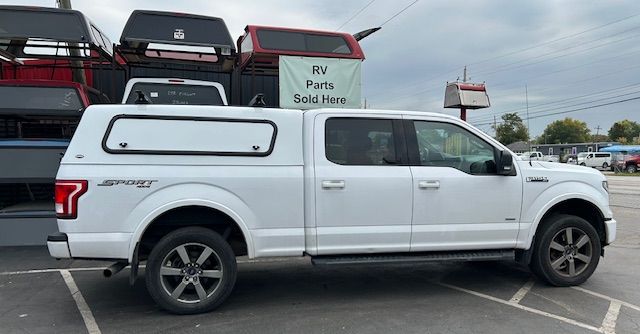 Red lashing strap in truck bed