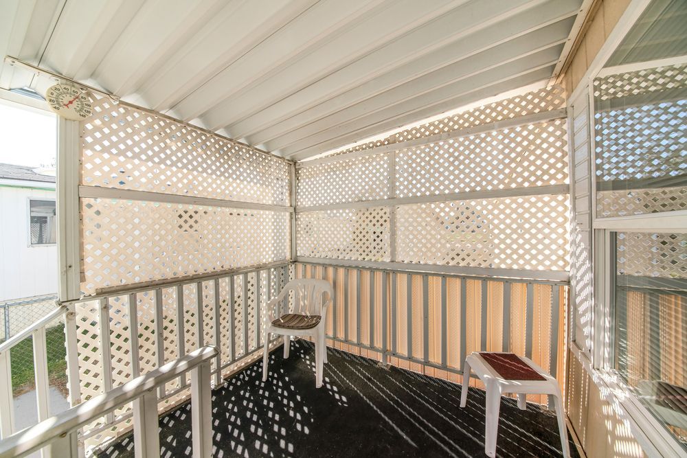 Patio With Lattice Privacy Screen And Chairs — Ulladulla Blinds & Home Improvements In Ulladulla, NSW