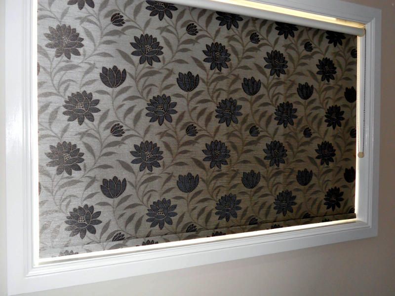 A Window With A Black And White Floral Pattern On It — Ulladulla Blinds & Home Improvements In Ulladulla, NSW