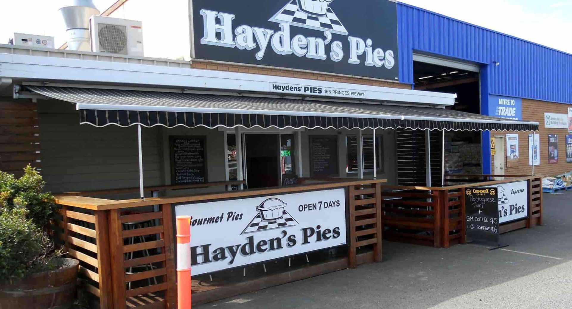 A Restaurant With A Wooden Deck — Ulladulla Blinds & Home Improvements In Sussex Inlet, NSW