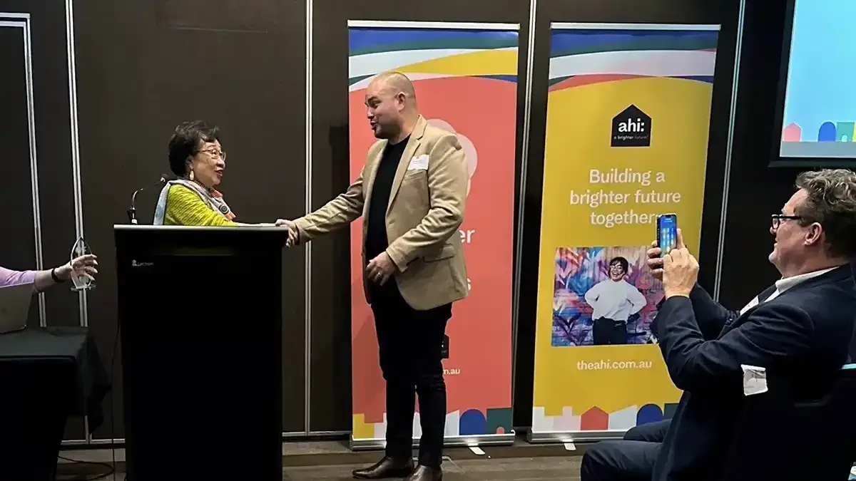 Sebastien Barbe receives his Future Leader award from Unis Goh.