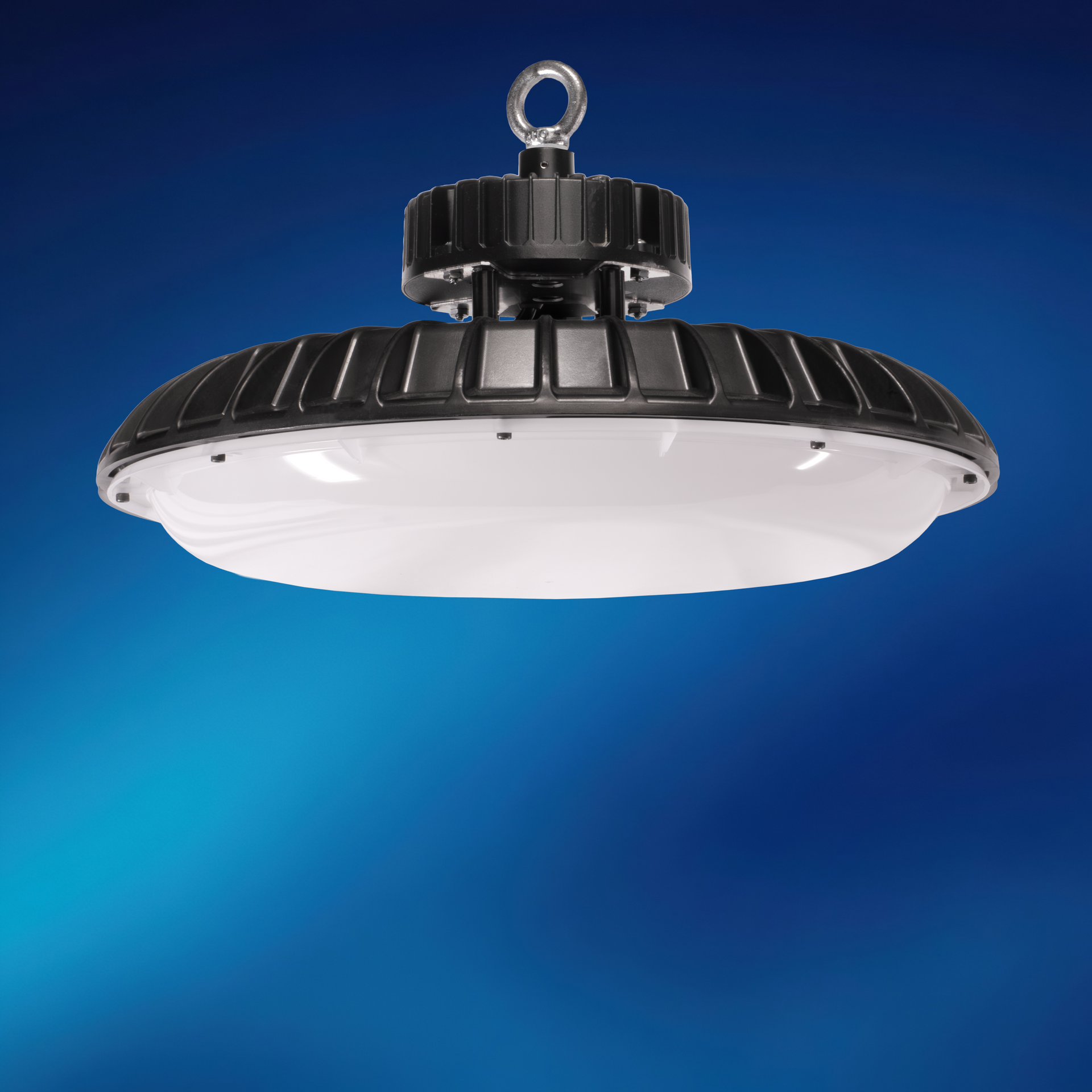 A light hanging from the ceiling with a blue background