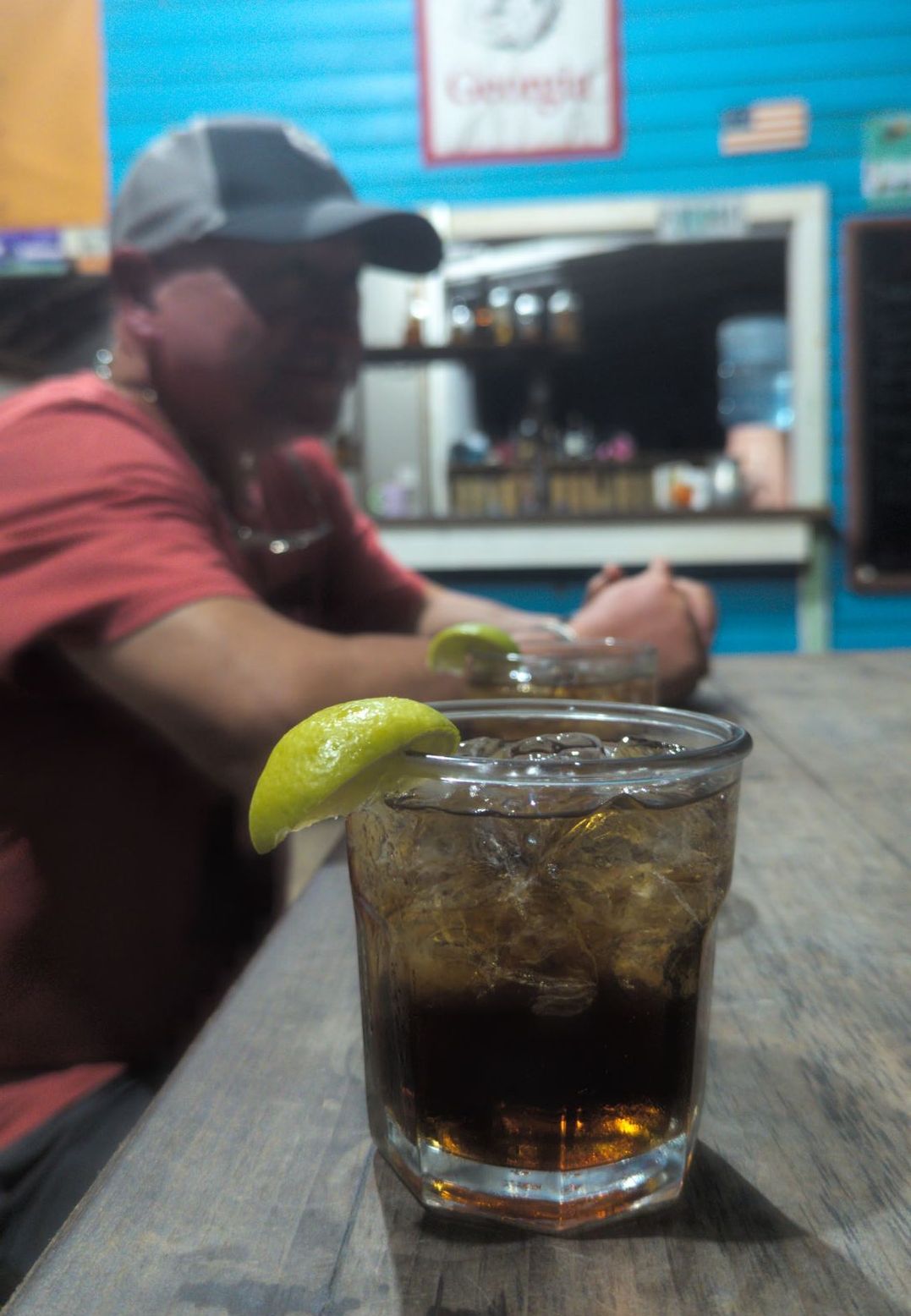 A rum and Coke at the Reef House bar