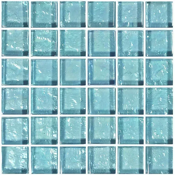 Blue glass mosaic tile pattern with a grid of small square tiles