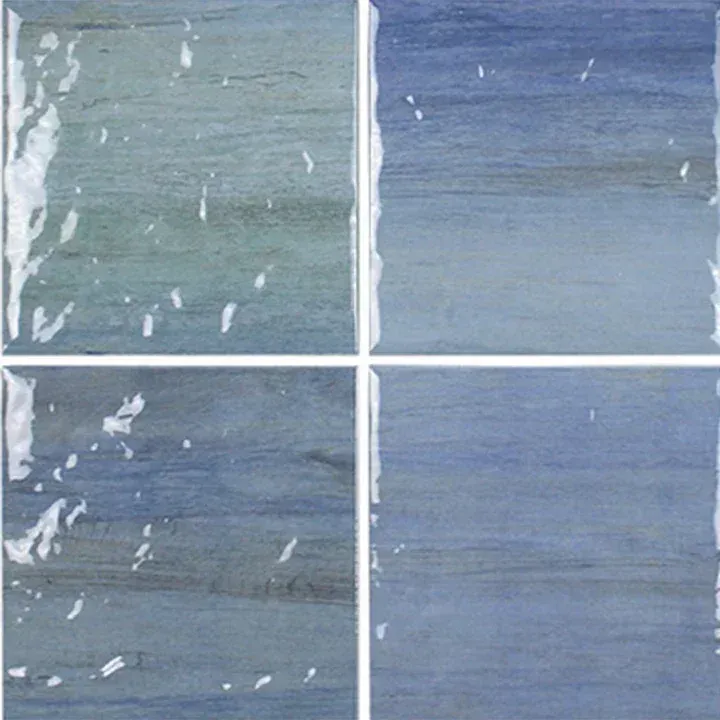 Abstract blue-gray textured surface divided into four panels by white lines