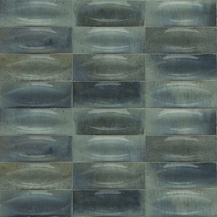 Abstract pattern of blue-gray rectangular tiles with soft oval textures and mottled shading