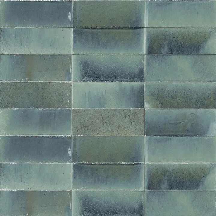 Abstract close-up of blue-gray tiled texture with a grid of rectangular panels