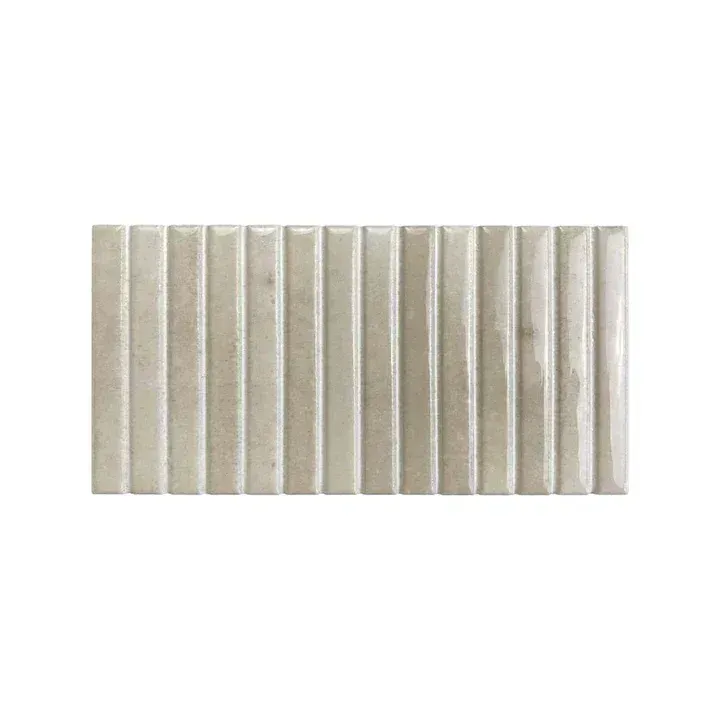 Beige ribbed rectangular panel with vertical grooves on a white background