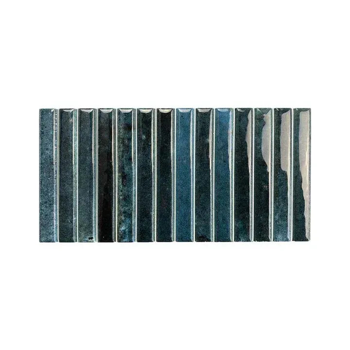 Row of narrow blue-gray glass or metal panels with reflective vertical stripes