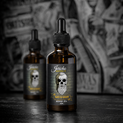 Two amber dropper bottles with skull labels on a dark table against a dollar-bill backdrop