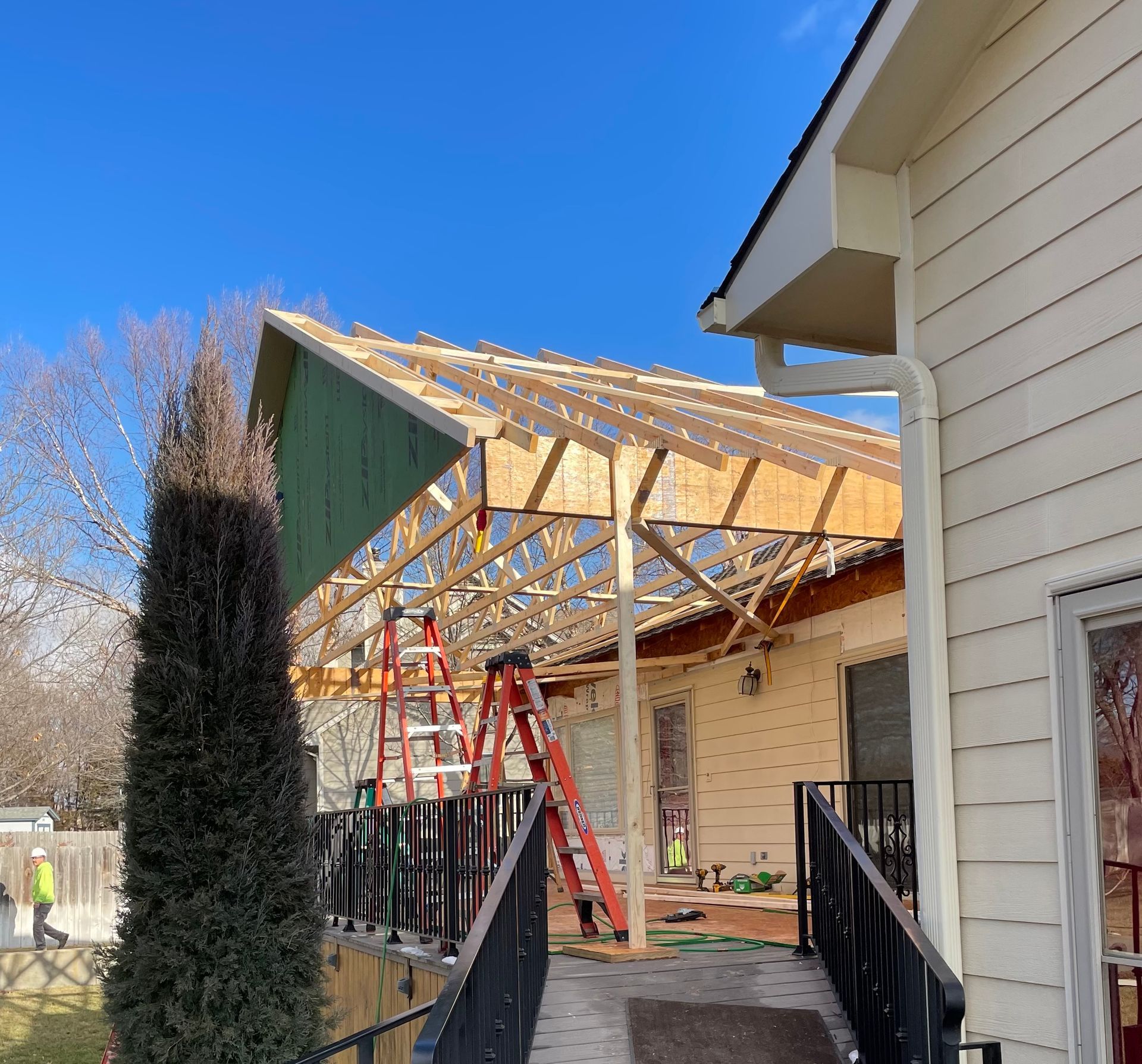 A house under construction with a ramp leading to it