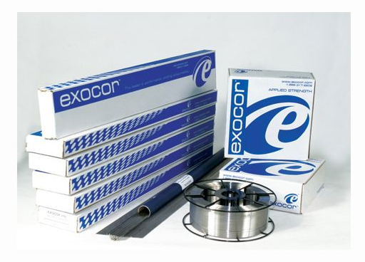 Des boîtes et une bobine de matériel de soudage Exocor. Le logo bleu et blanc est visible.
