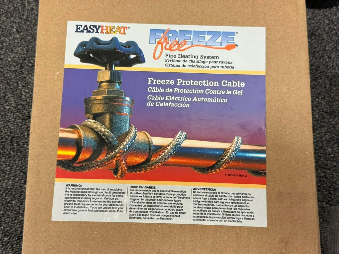 Boxed EasyHeat Freeze Free pipe freeze protection cable. Label shows cable wrapped around a pipe and valve.