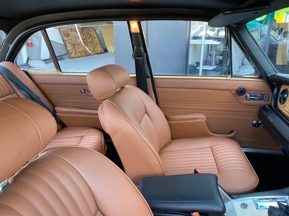 The Interior of a Car With Brown Leather Seats — Currumbin Trimmers In Currumbin Waters, QLD