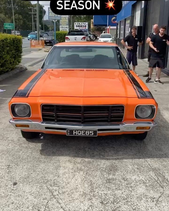 An Orange Car With A License Plate — Currumbin Trimmers In Currumbin Waters, QLD