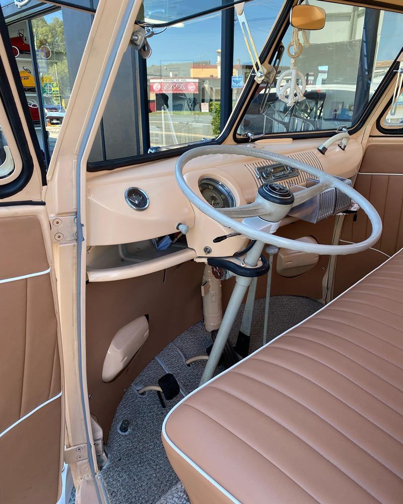 A Close Up of the Interior of a VW Bus With a Steering Wheel — Currumbin Trimmers In Currumbin Waters, QLD