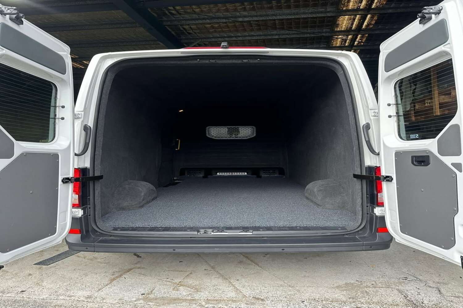The Back Of A White Van With Its Doors Open — Currumbin Trimmers In Currumbin Waters, QLD