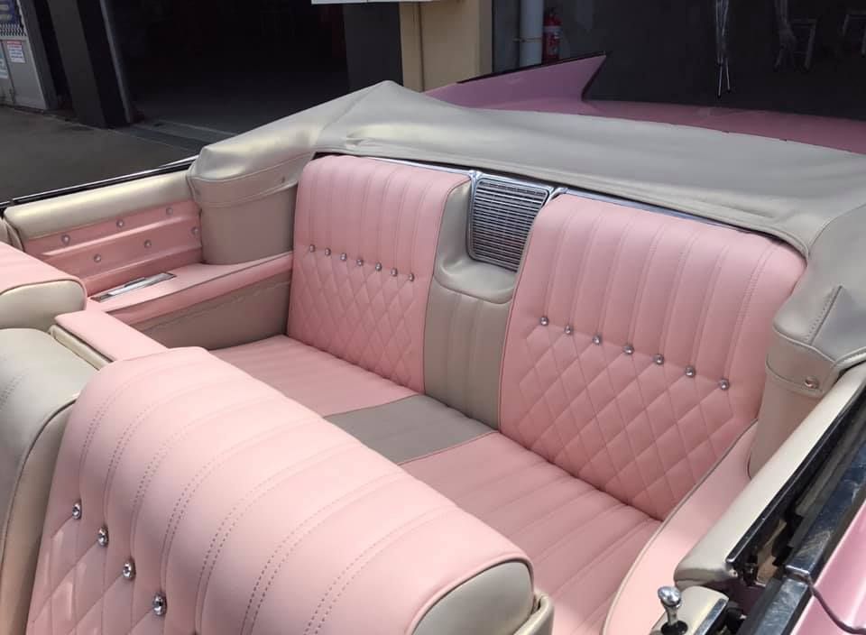 The Back Seat of a Pink and White Convertible Car — Currumbin Trimmers In Tweed Heads, NSW