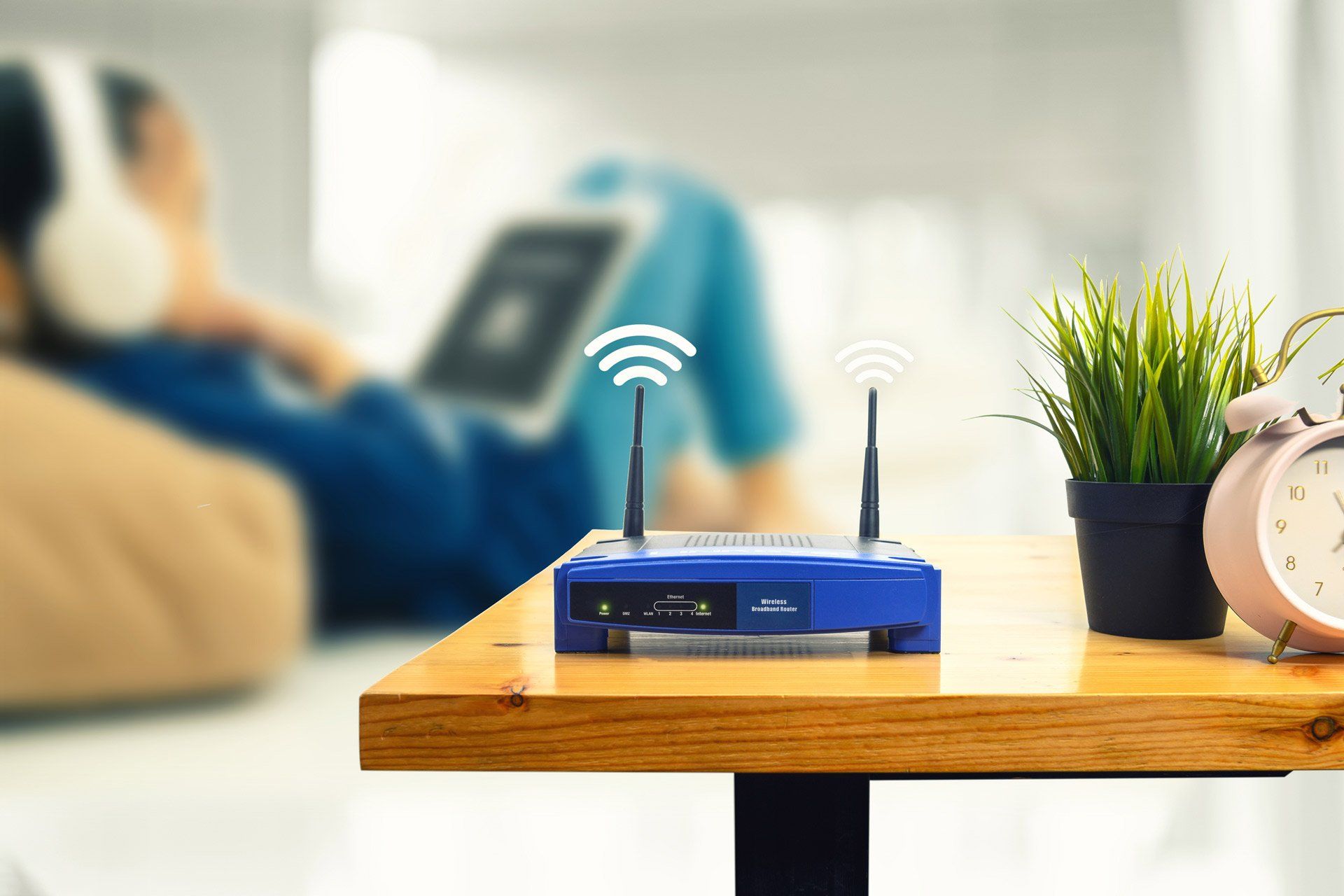 Wireless Router and a Man Using Smartphone — Greater Sydney, Nsw — Connex Antenna & Security