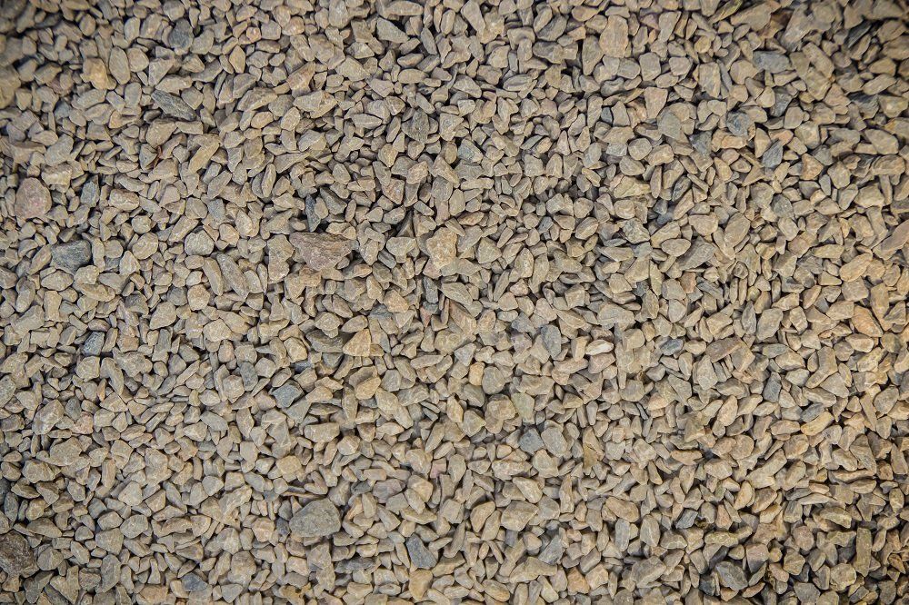 Close-up view of small, light-brown gravel rocks.