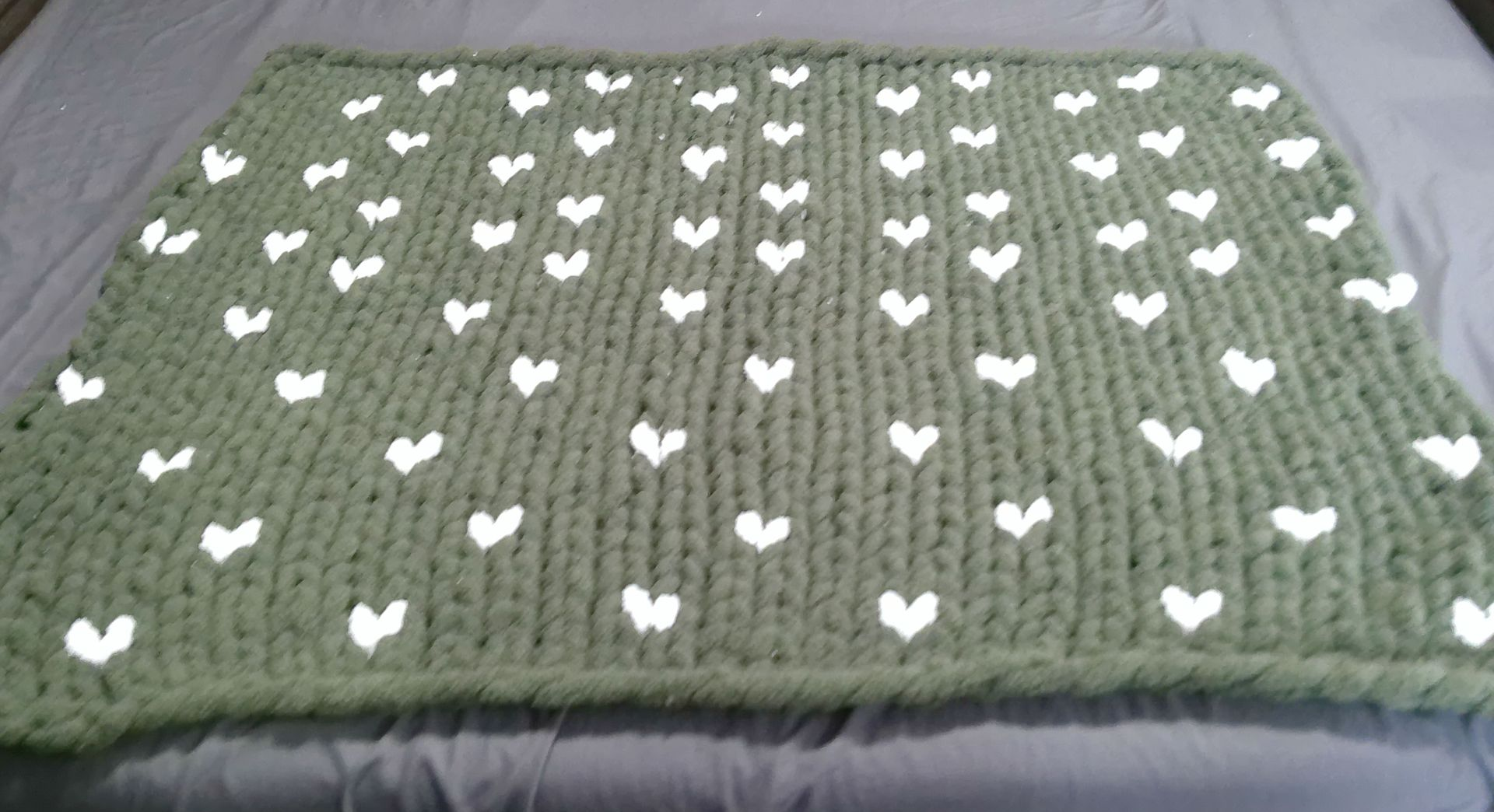 Green Chunky Knit Blanket With Glow In The Dark Hearts