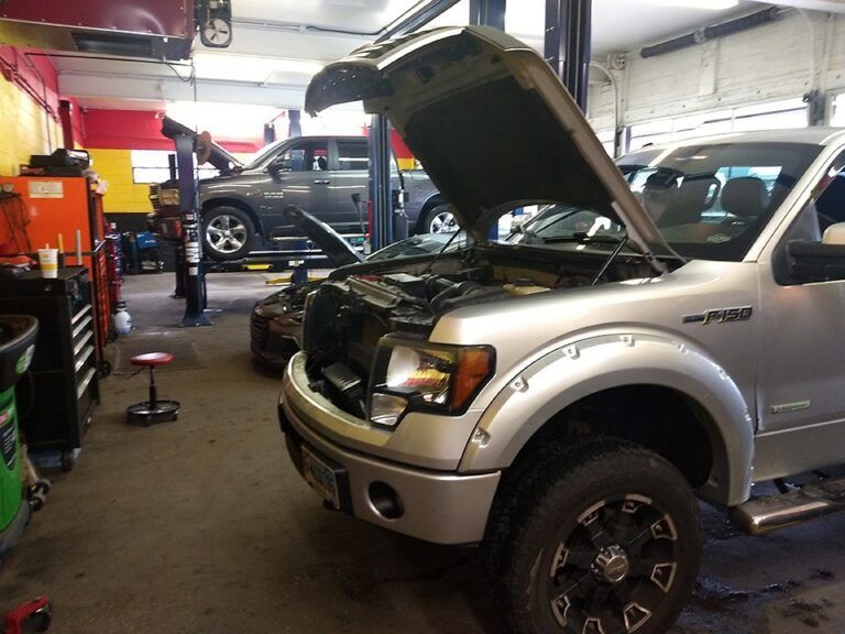 silver and grey car in garage | Forrest Automotive