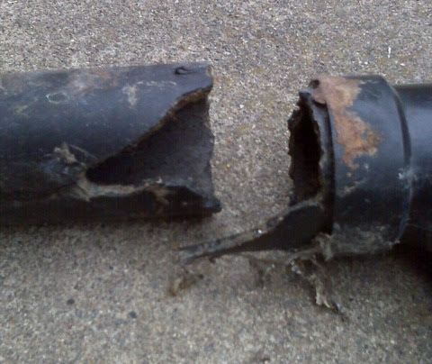 Close-Up Of A Broken Pipe On The Ground — New Boston, MI — All Drains LLC