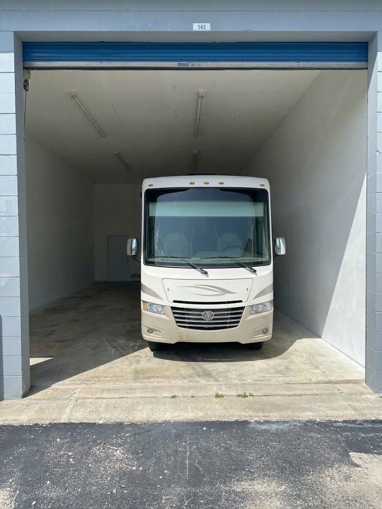 Motorhome parked inside enclosed large unit 143