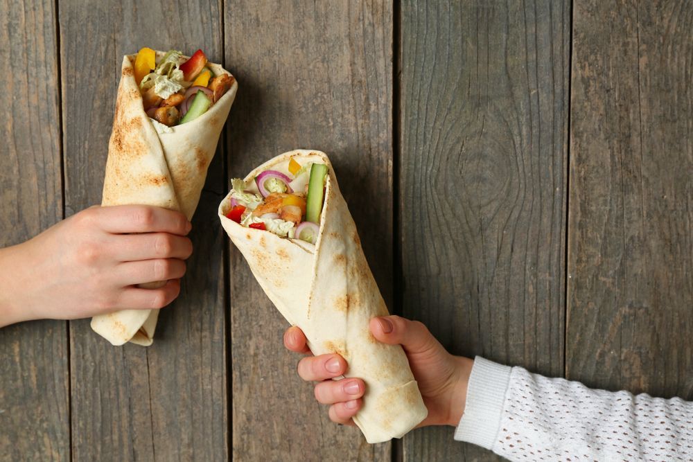 A Bowl of Vegetables with Chopsticks in It — Gungahlin Kebab and Pizza in Gungahlin, ACT