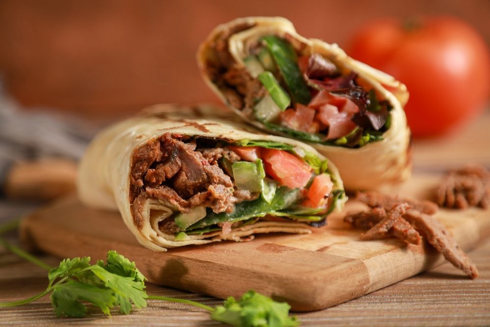 A White Plate Topped with A Steak , French Fries and Vegetables — Gungahlin Kebab and Pizza in Gungahlin, ACT
