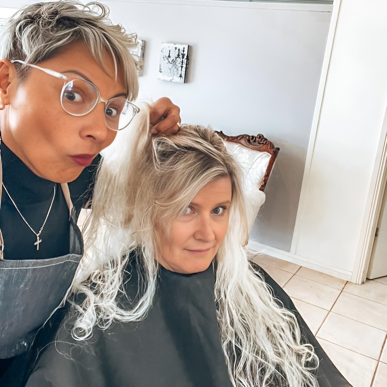 Woman is Getting Her Hair Cut by Another Woman — Lavie Hair & Beauty in Ciccone, NT