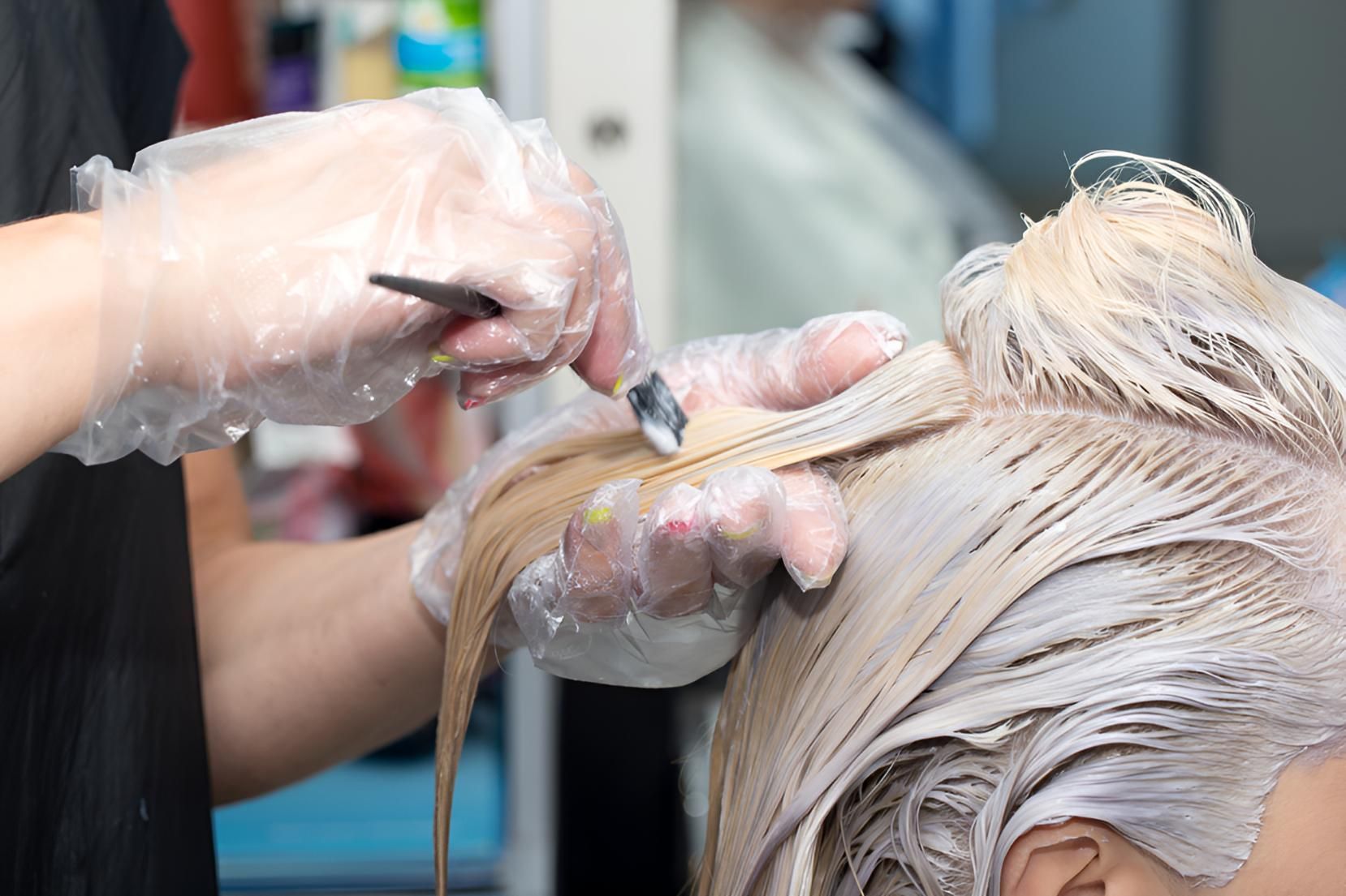 Woman is Getting Her Hair Dyed in a Salon — Lavie Hair & Beauty in Ciccone, NT