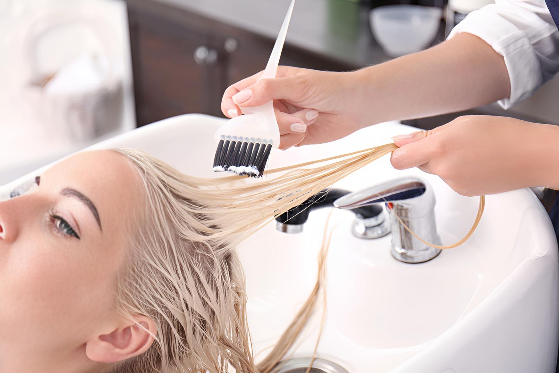 Woman is Getting Her Hair Dyed in a Salon — Lavie Hair & Beauty in Ciccone, NT